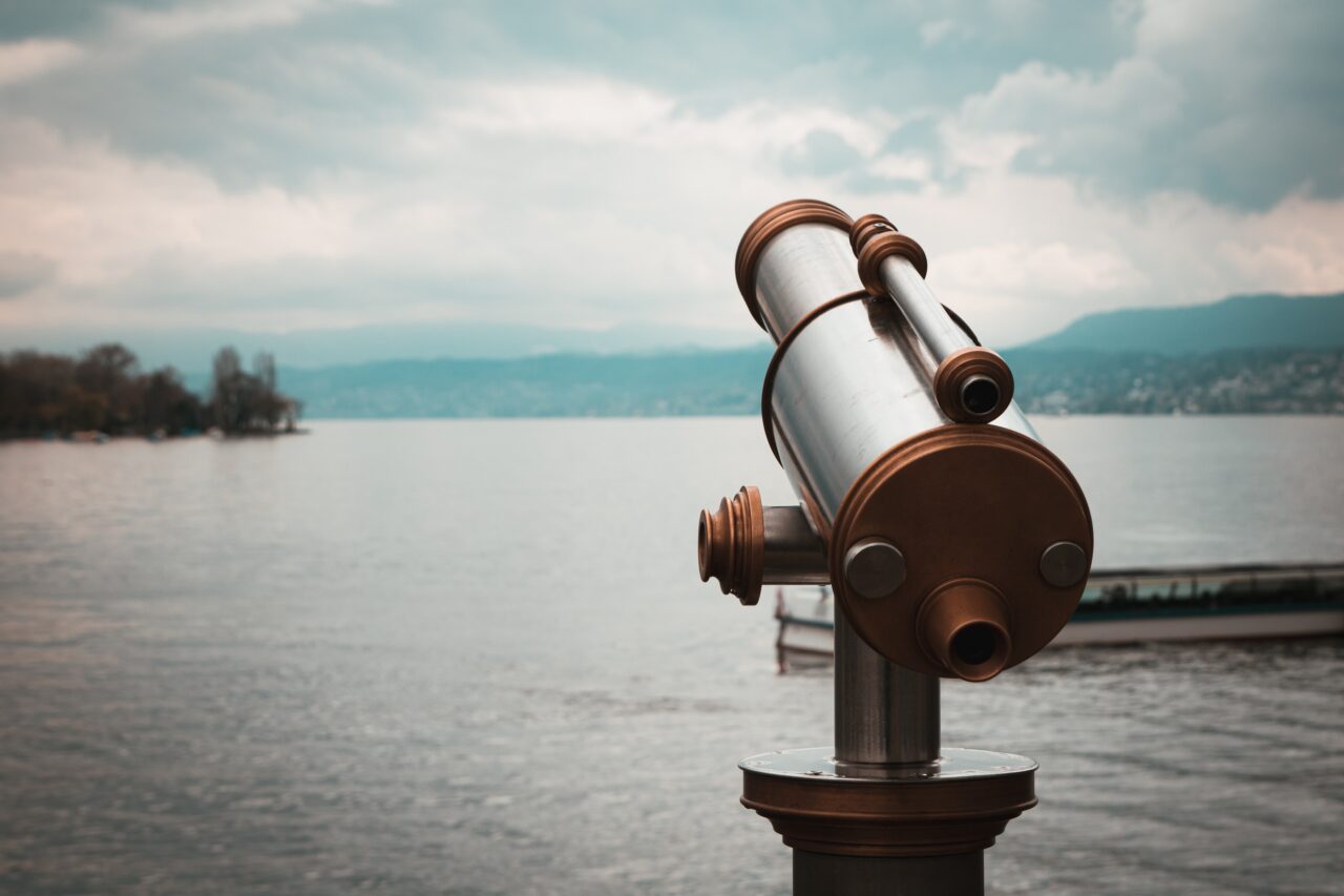 Telescope overlooking a lake.