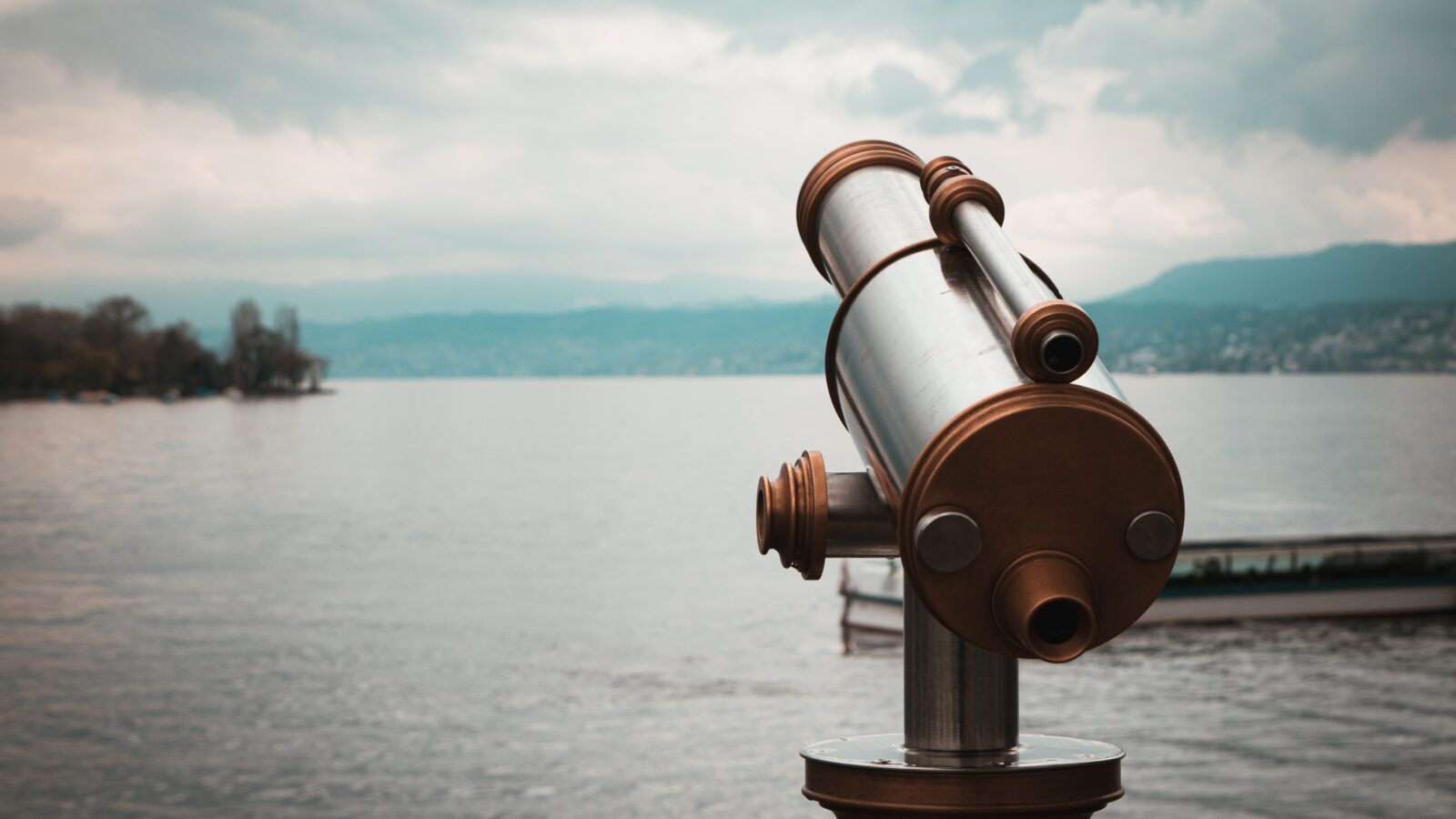 Telescope overlooking a lake.