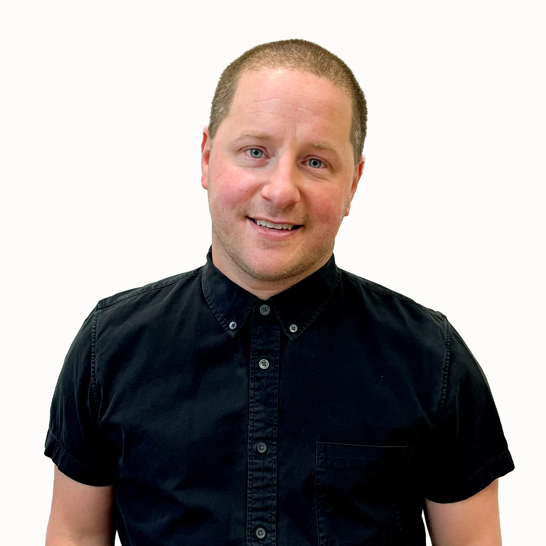 Chris Heuberger, a white male in his 40s with short hair, in a black collared short-sleeve shirt.